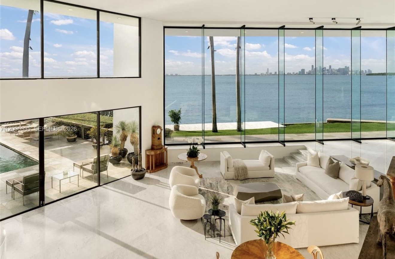 Double-height living room with views of Biscayne Bay